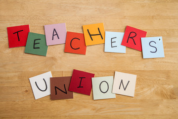 Teachers' Union on color tiles in capital letters - education.