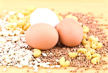 Three eggs, oat flakes, buckwheat, pasta and spaghetti