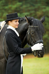 jockey in uniform with horse