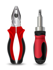 Pliers and screwdriver on white background. Professional tools.