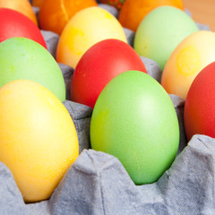 Fototapeta na wymiar Bright background of colorful eggs