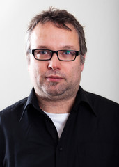 Obraz premium Real People Portrait: Serious Mid-Age Caucasian Man