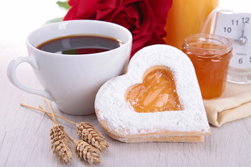 coffee and heart shape biscuit