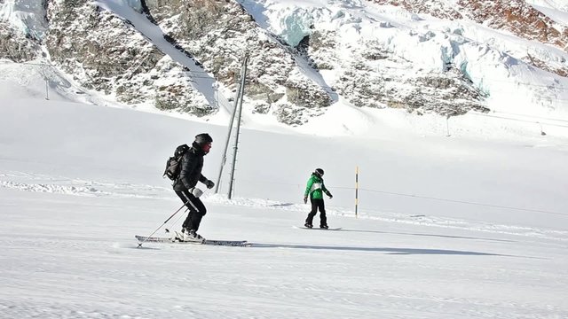 skier downhill saas fee