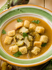 artichoke soup with toasted sliced bread, vegetarian food
