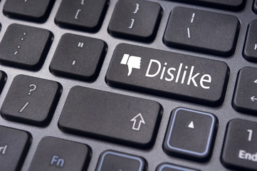 dislike message on keyboard button, antisocial media concepts