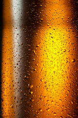 Water drops texture on the bottle of beer. Abstract background