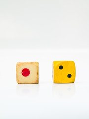 A pair of used dice isolated on white background.