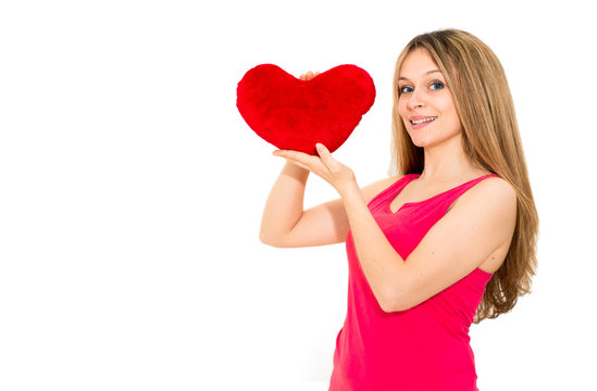woman holding a red heart