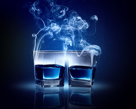 Two glasses of blue cocktail