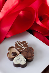 arrangement of heart shaped chocolates