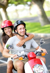 Free young couple on scooter on summer vacation © Maridav