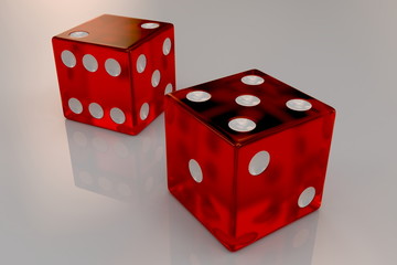 Two glossy red plastic bouncing dices