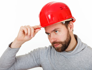 Construction worker in a red helmet.
