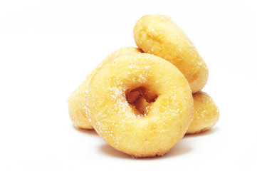 donuts with sugar on white background