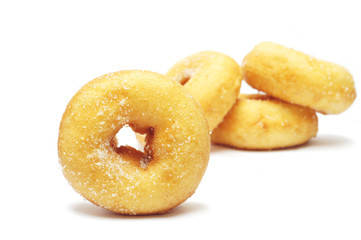 donuts with sugar on white background