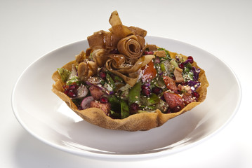 Arab style salad fattouche with dry bread.