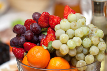 Fresh fruits and berries on the dining table