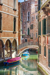 Romantic canal and bridge in center of Venice, Italy