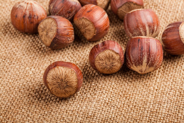 Filberts on a burlap background. Close-up shot.