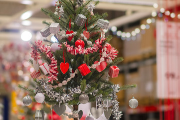 New year trees with decorations and accessories in large mall