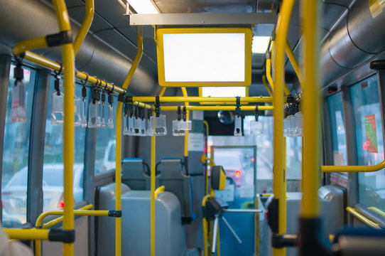 interior of modern city bus with information screen