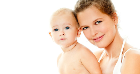 Young mother hugging baby