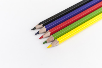 Fototapeta premium Colored pencils on white background