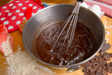 Busy kitchen making brownies with  ingredients