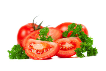 Cut tomatoes into slices with parsley leaves
