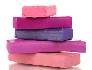 Children bright plasticine isolated on white