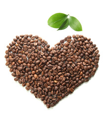 Coffee beans with leaves isolated on white