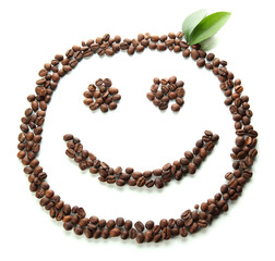 Coffee beans with leaves isolated on white