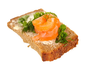 Salmon sandwich on plate, close up