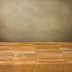 Background with wooden board over grunge wall