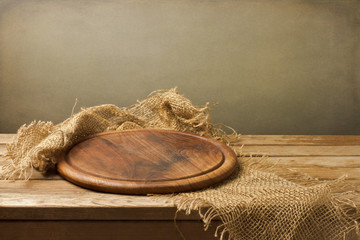 Background with wooden board over grunge background