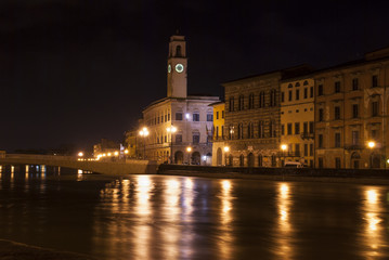 Pisa by night from the river.