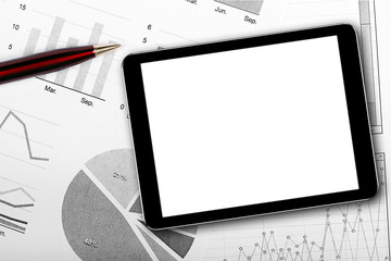 blank digital tablet on business documents