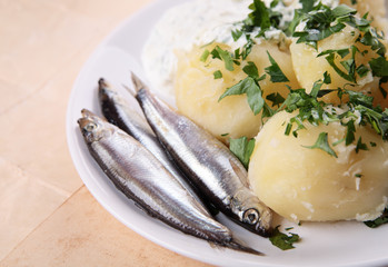 Boiled potatoes with salted fish