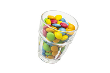 colorful chewy dragees close up on a white background