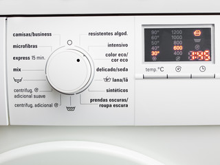 Display washing machine. Macro photo part of modern home washing
