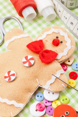 Sewing set and handmade gingerbread man from textile