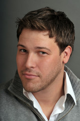 Obraz premium young male actor making emotional facial expression