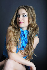Naklejka premium bright portrait of the beautiful girl with long hair