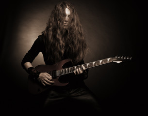 Furious metal guitarist