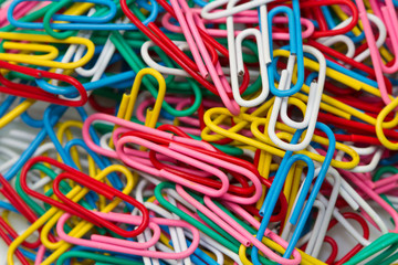 Multicolored paper clips background