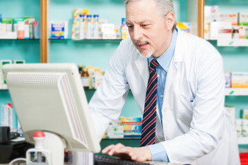 Man at work in a pharmacy