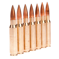 Golden bullet isolated on white background
