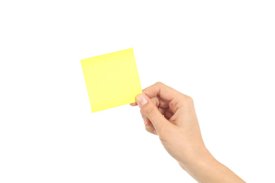 Woman Hand Holding A Yellow Notepaper