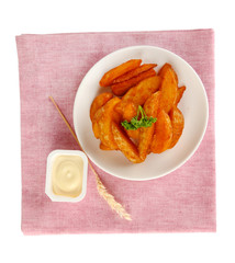 Appetizing village potatoes on plate isolated on white